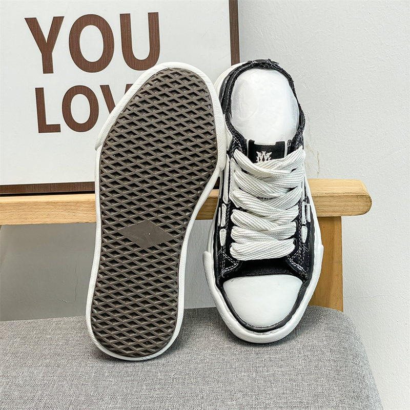 2026 TEMAI Bone-patterned shoes, versatile and trendy, low-top black and white men's sneakers Casual sports shoes for women