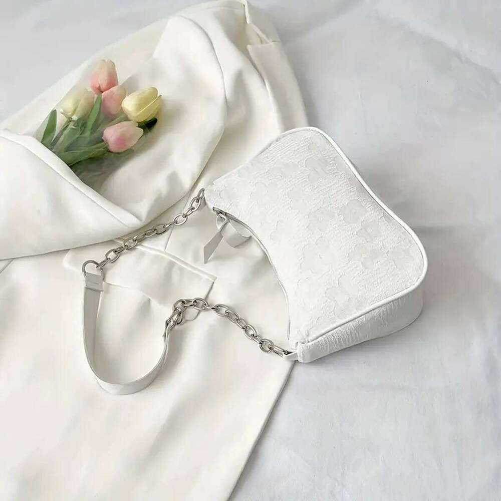 This white elegant gentle chain underarm bag for women is foreign-style, simple and small square bag. It's fashionable a C260204