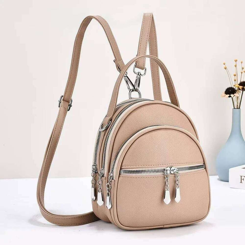 A high-quality multi-functional small backpack for ladies, new mini handbag in solid color, with a casual school style Z260202