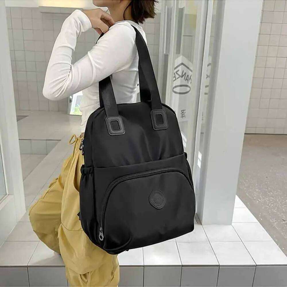 Korean Style Sport Backpack Large Capacity Solid Color Travel Shoulder Niche Design Nylon Fitness Bag Office Worker Z260204