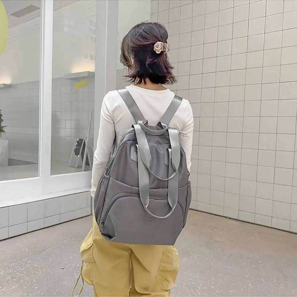 Korean Style Sport Backpack Large Capacity Solid Color Travel Shoulder Niche Design Nylon Fitness Bag Office Worker Z260204