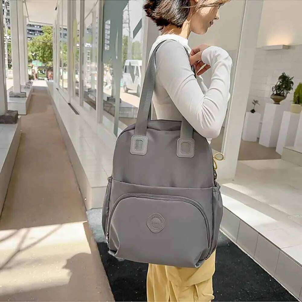 Korean Style Sport Backpack Large Capacity Solid Color Travel Shoulder Niche Design Nylon Fitness Bag Office Worker Z260202