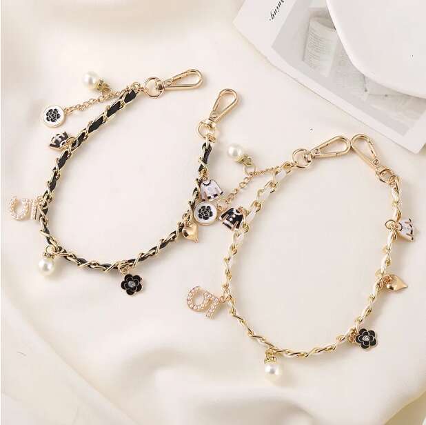 Golden Cherry Keychain Charm - Shiny Resin Metal Bag Accessory Elegant Gift for Women Purse or Handbag Decoration