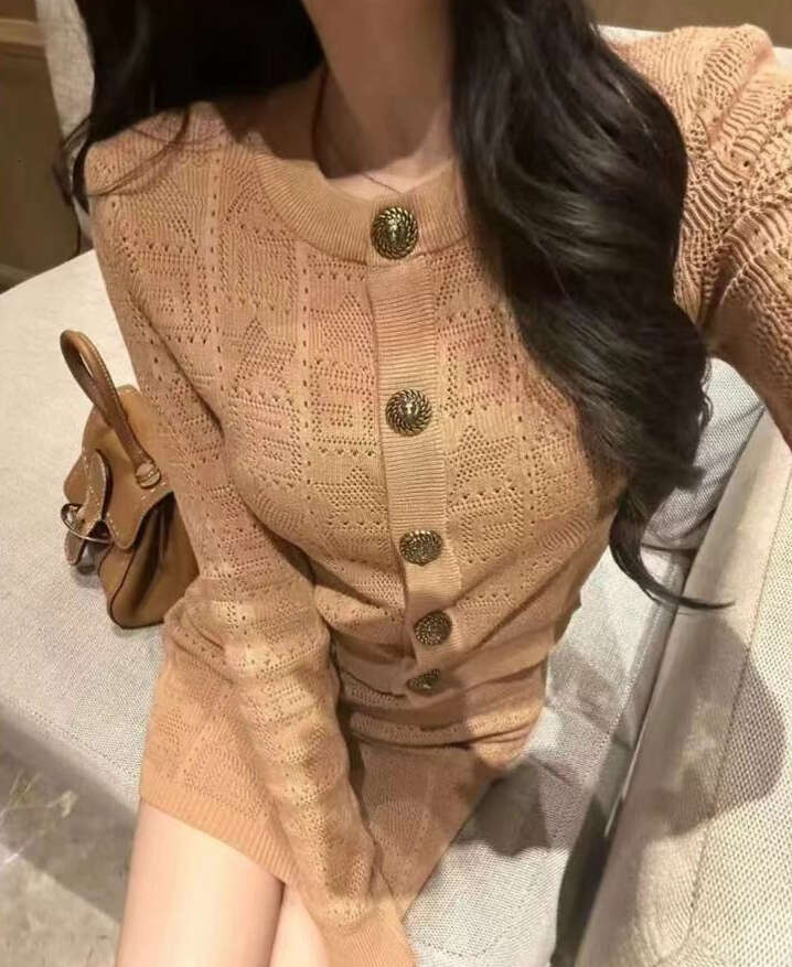 Designer style metal buckle hollow knit women's cardigan 2026 autumn new slim fit high-end jacket