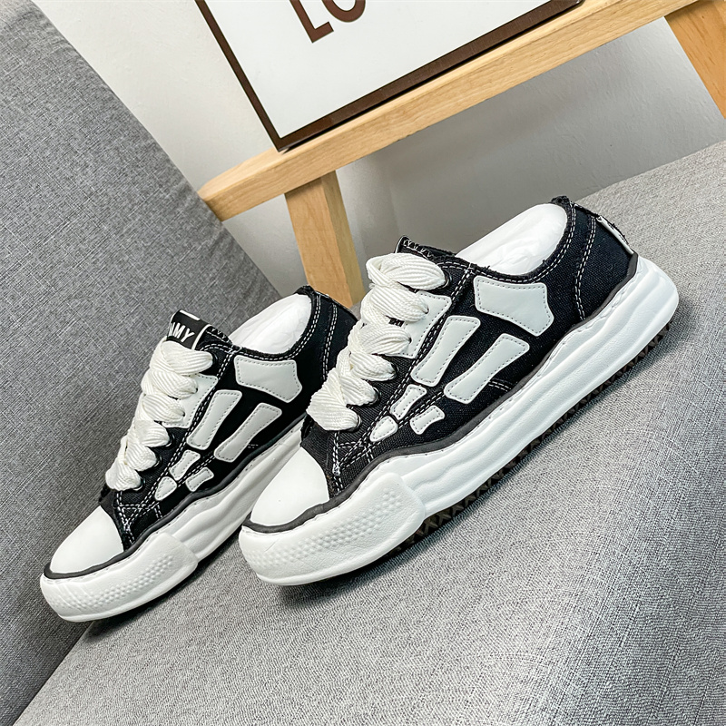 2026 TEMAI Bone-patterned shoes, versatile and trendy, low-top black and white men's sneakers Casual sports shoes for women