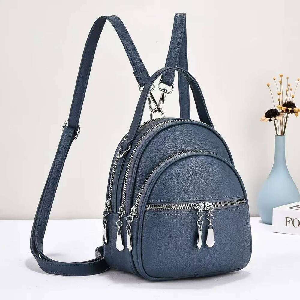 A high-quality multi-functional small backpack for ladies, new mini handbag in solid color, with a casual school style Z260202
