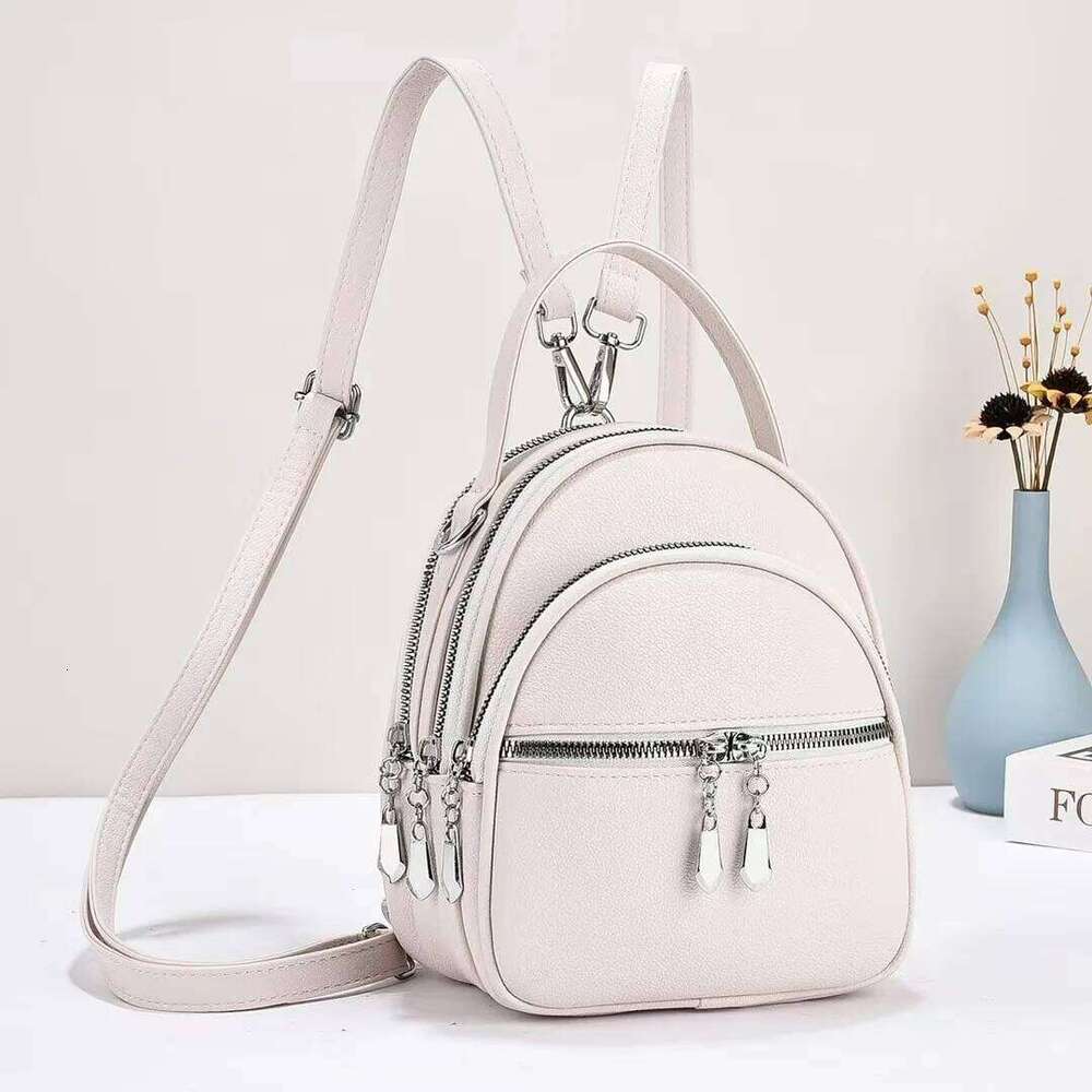 A high-quality multi-functional small backpack for ladies, new mini handbag in solid color, with a casual school style Z260204