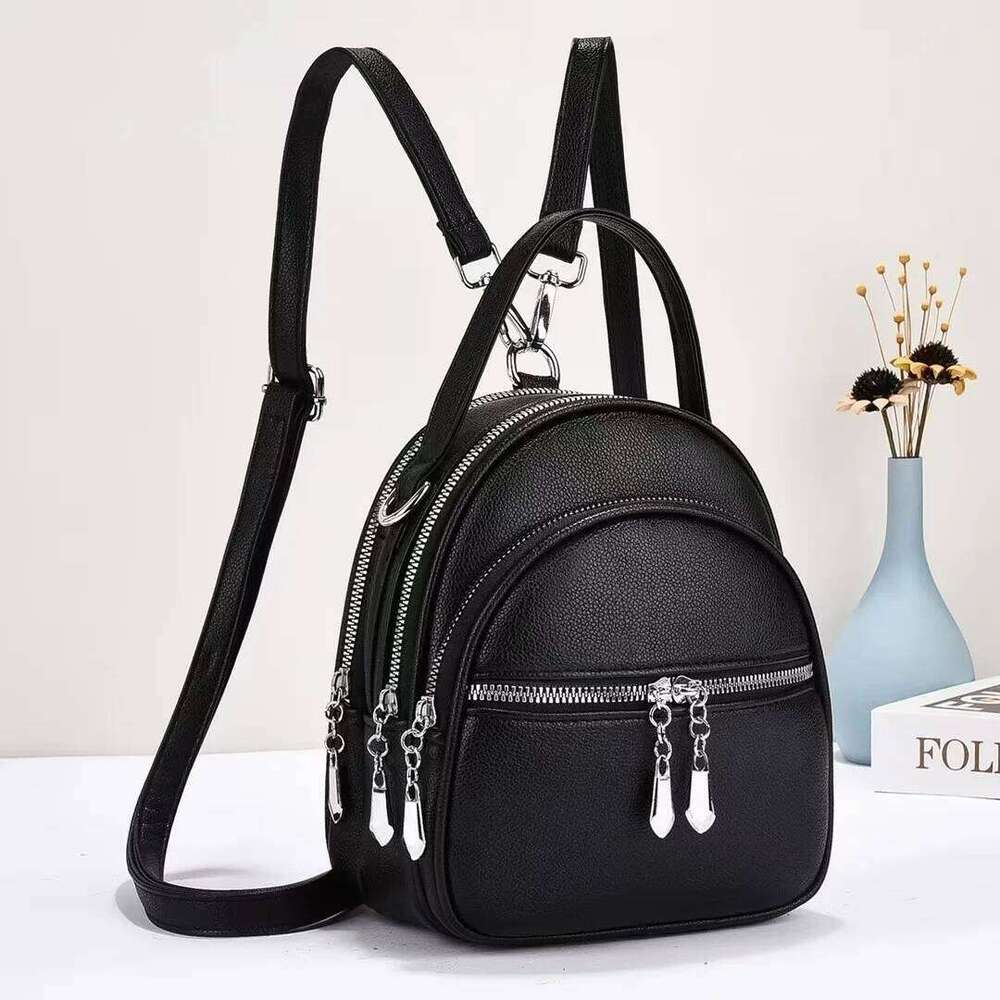 A high-quality multi-functional small backpack for ladies, new mini handbag in solid color, with a casual school style Z260204