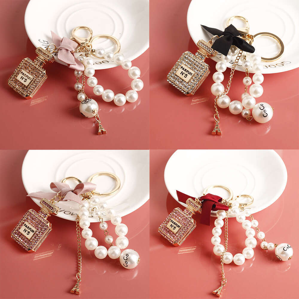 Korean Version Creative Fashion Inlaid with Diamonds Perfume Bottle Keychain Bowknot Pearl Bag Pendant Gift