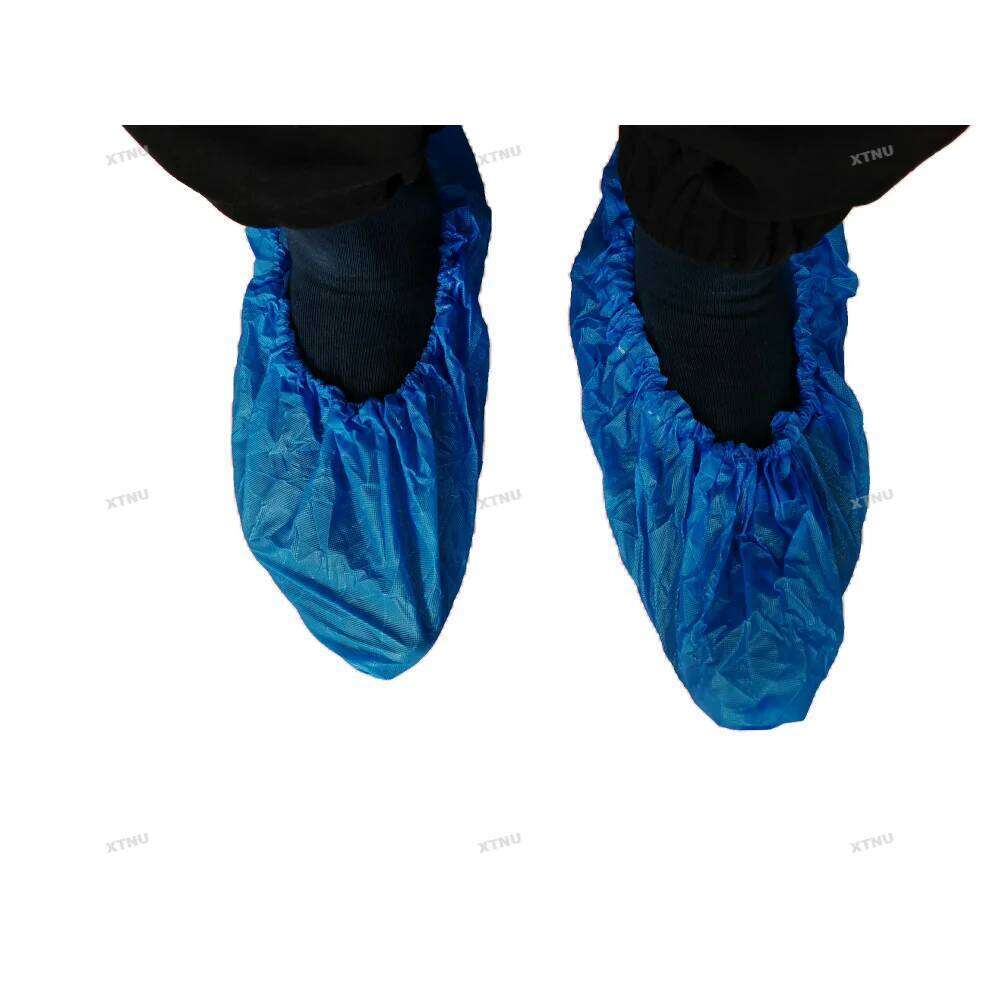 100pcs Disposable 6.7g Water-Proof Non-Slip Plastic Shoe Covers CPE Material hand made shoe cover S260204