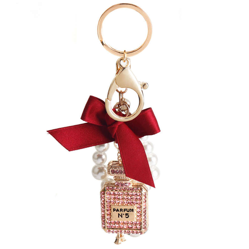 Korean Version Creative Fashion Inlaid with Diamonds Perfume Bottle Keychain Bowknot Pearl Bag Pendant Gift