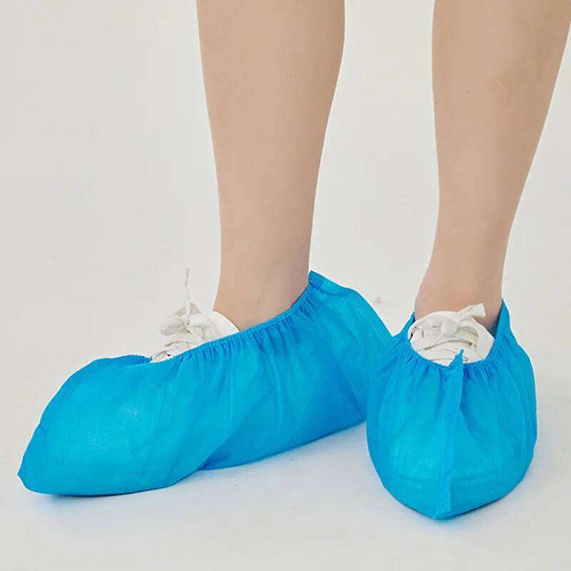 100PCs a pack Disposable Non-woven Household Foot Dustproof Non-slip shoe Cover Children Students Adult S260204