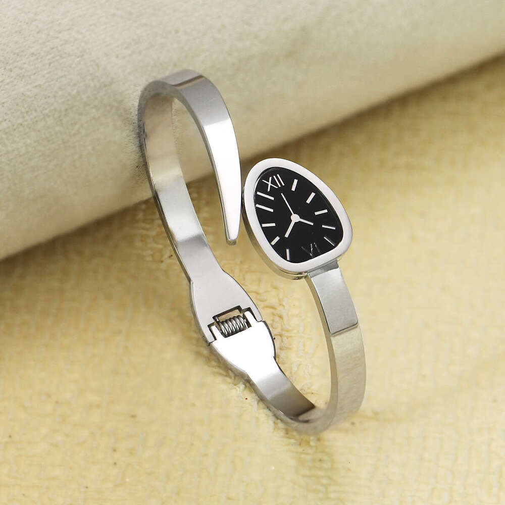 Vintage Watch-style Snake-shaped Quartz Oval Dial Band Roman Numerals Hollow Titanium Steel Bracelet