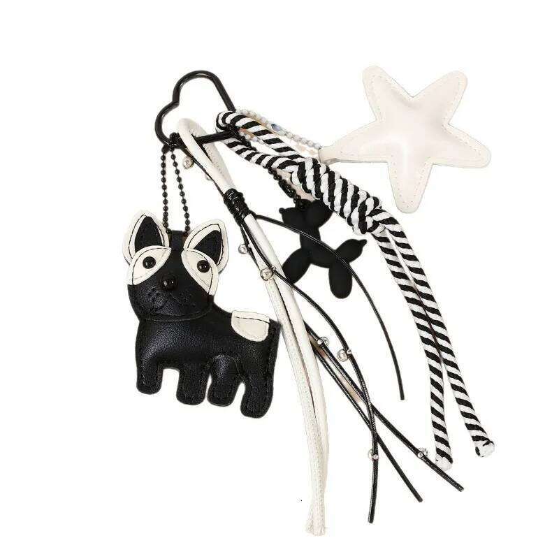 Designer women's black white wind cute magic doggie star leather bag niche creative versatile accessories pendant 26L0205