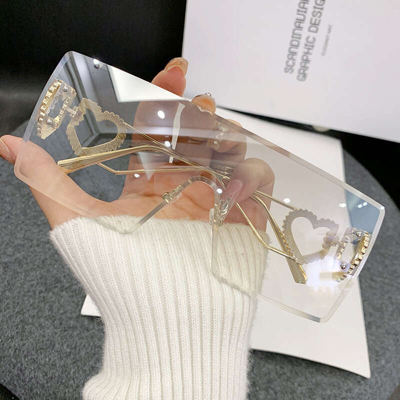 2024 new fashion onepiece heartshaped rimless european and american y2k internet celebrity style trendy sunglasses crossborder