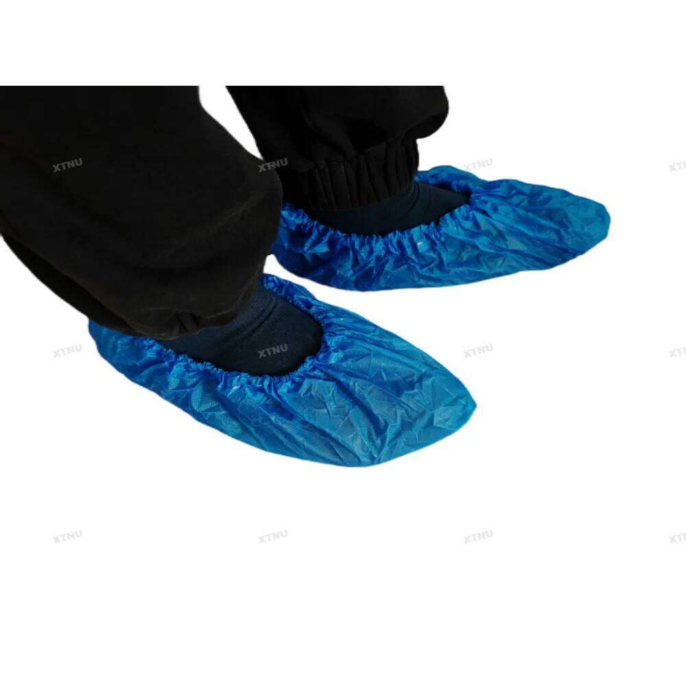 100pcs Disposable 6.7g Water-Proof Non-Slip Plastic Shoe Covers CPE Material hand made shoe cover S260204