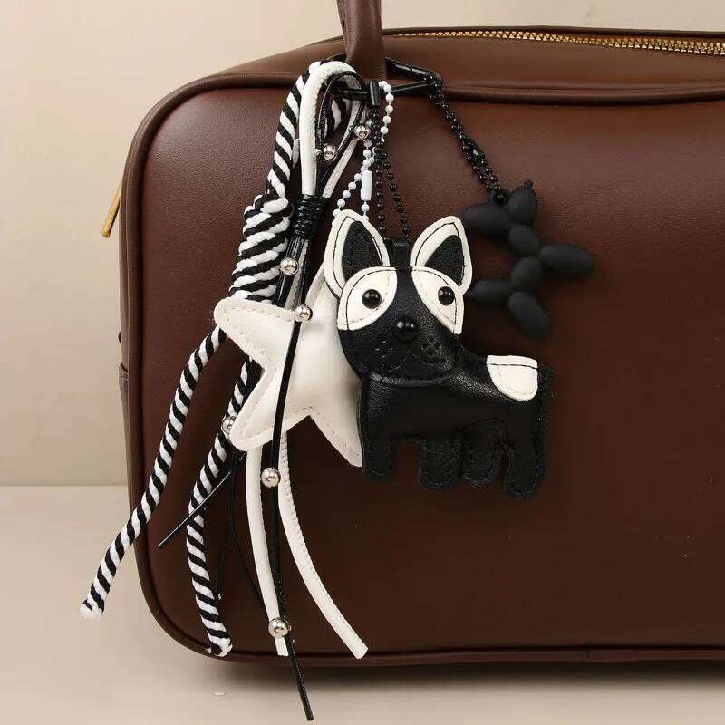 Designer women's black white wind cute magic doggie star leather bag niche creative versatile accessories pendant 26L0205
