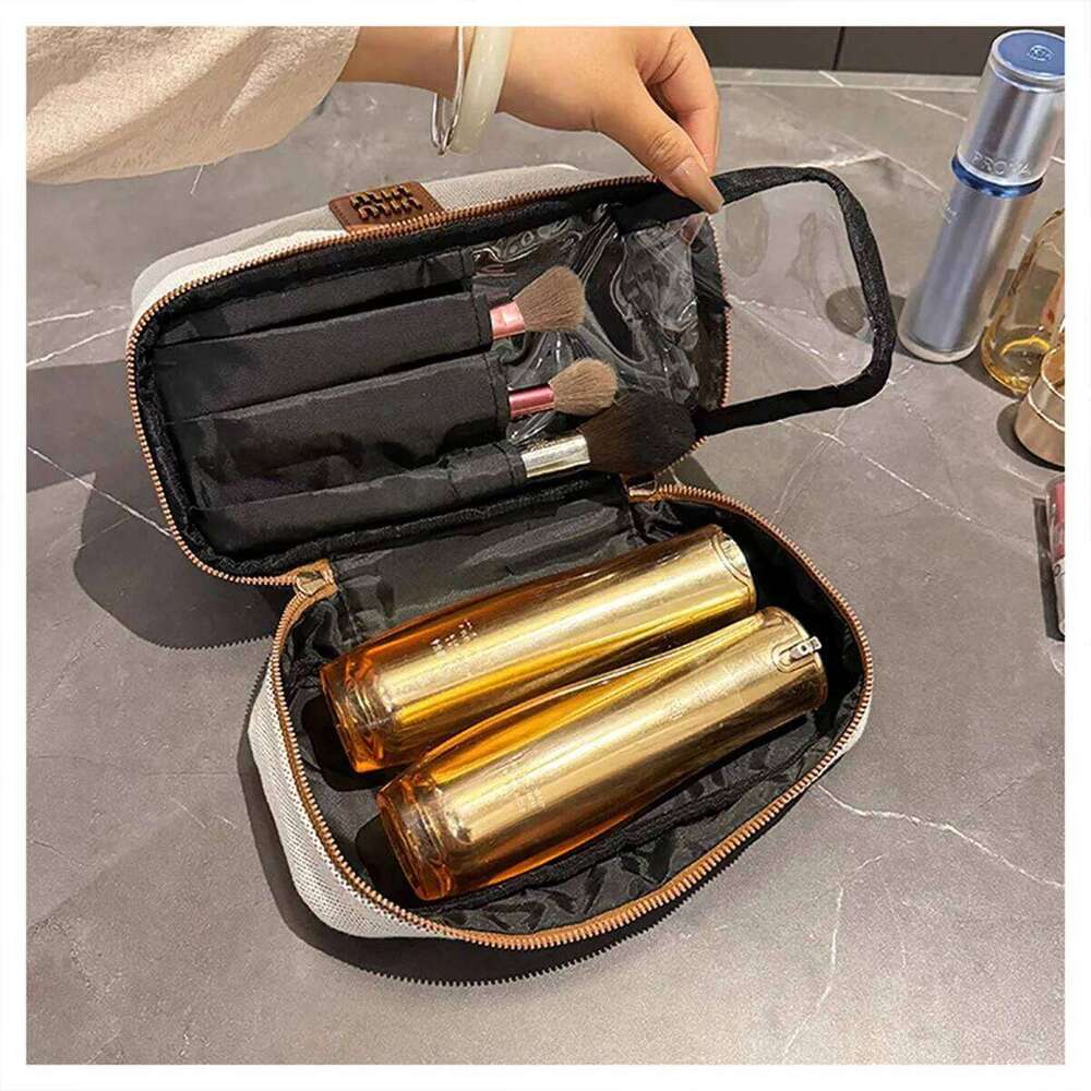 Double-layer metal label cosmetic bag, retro canvas portable hand-held bag with a high-end feel for storage Y260206