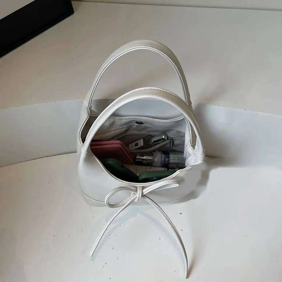 Korean Style Bow Knot Unique PU Leather Women's Simple Commuter Single Shoulder Large Capacity Underarm Tote Bag Y260205
