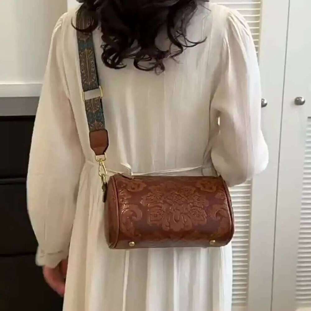 Chic Floral Embossed Crossbody Bag: Urban Elegance with Secure Zip, Durable Design & Wide Strap for Everyday Style XJ260129