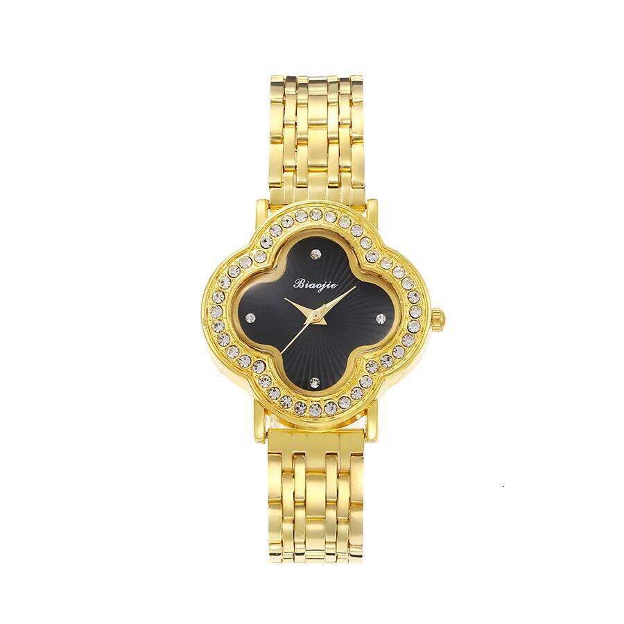 New clover hand chain with diamond leisure quartz women's wristwatch for students in summer graduation season. Z260206