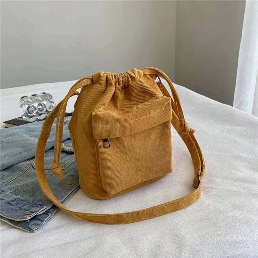 2025 New Women Middle Shoulder Korean Style Drawstring Bucket Casual Light Youth Crossbody Bag Whole Sale XJ260129