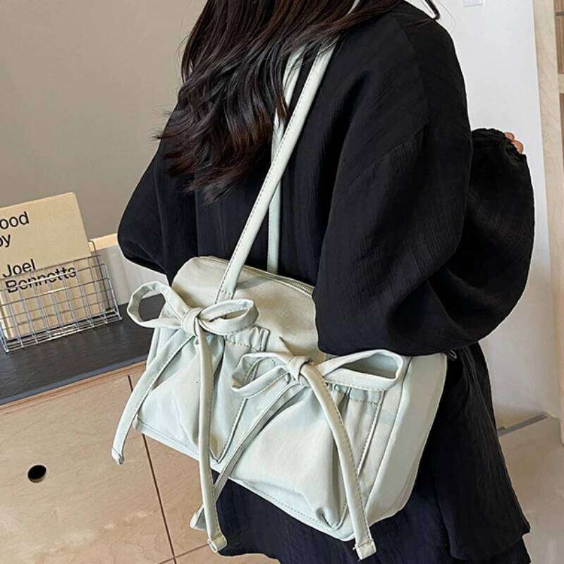 2024 New Korean Bow Nylon Shoulder Fashionable and Sweet Design Tote Bag Folded Large Capacity Commuter Women's Handbag Y260205