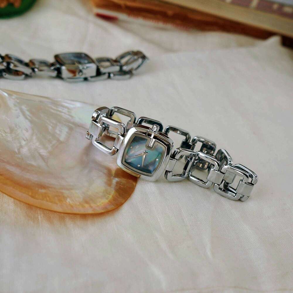 1pc Women's Elegant High-End Fashion Luxury Quartz Watch, Stainless Steel Band, Rhinestone & Mother Of Pearl Dial, Hollow Design Z260206