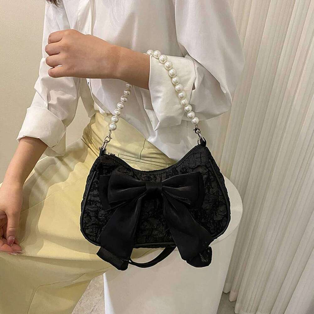 White folds pop retro bow Female Pearl handle New fashion pearl armpit shoulder crossbody bag 1 outfit Y260205