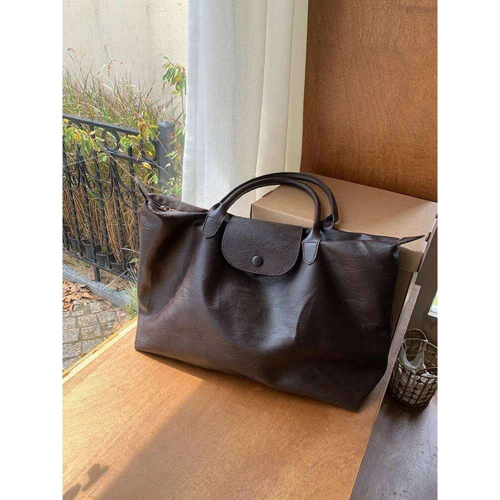 2026 New Travel Fashion and Leisure Women's Daily Commuter Large Capacity Lightweight Luggage Shoulder Bag Y260205