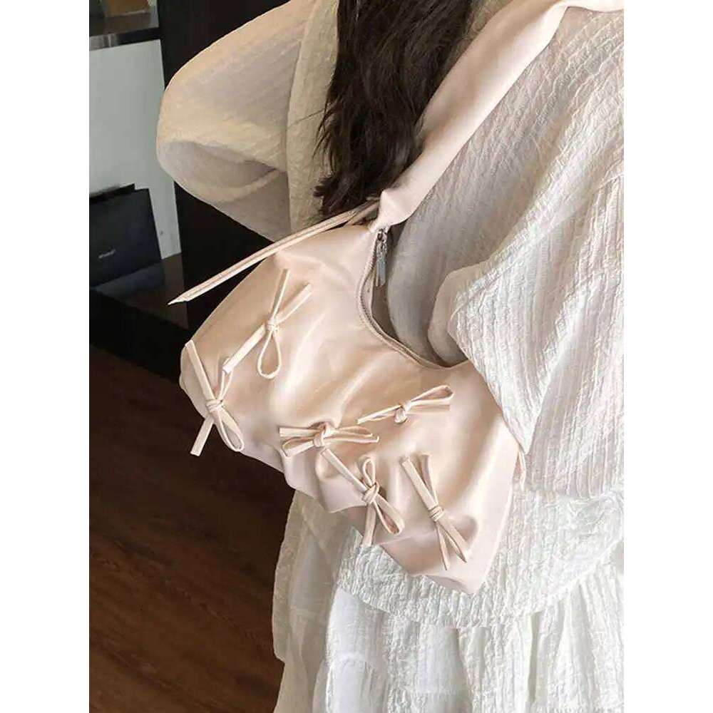 Korean Design Sense Single Shoulder Bags Spring Summer 2025 New Women's Bow Decoration Armpit Bag Niche Commuting Pleated Pack Y260205