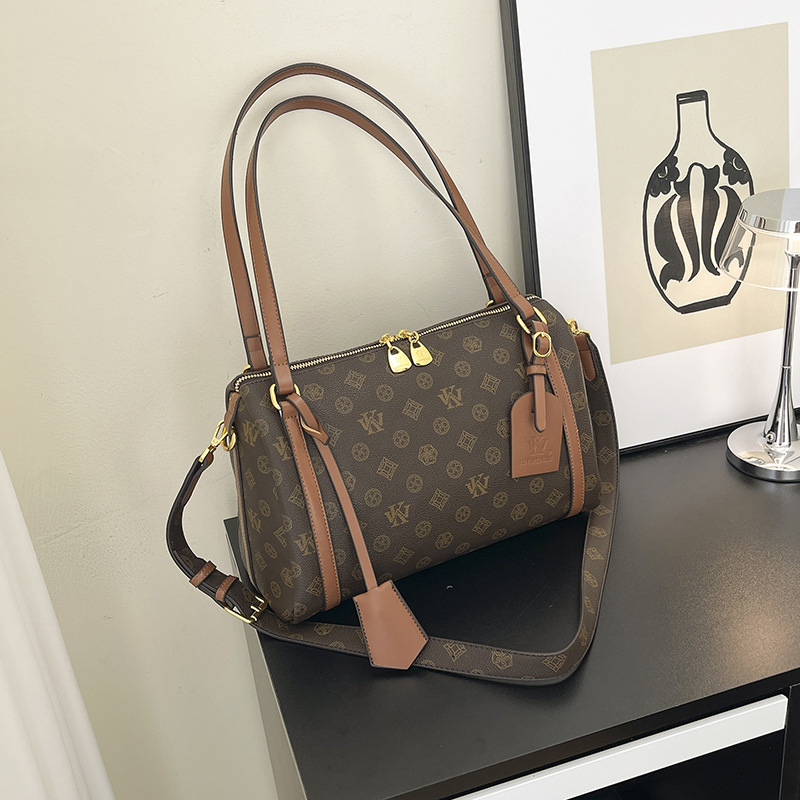 LUYIWEINASI Premium sense portable pillow bag women's 2025 new retro printed women's cylinder bag shoulder bag oblique span bag tide