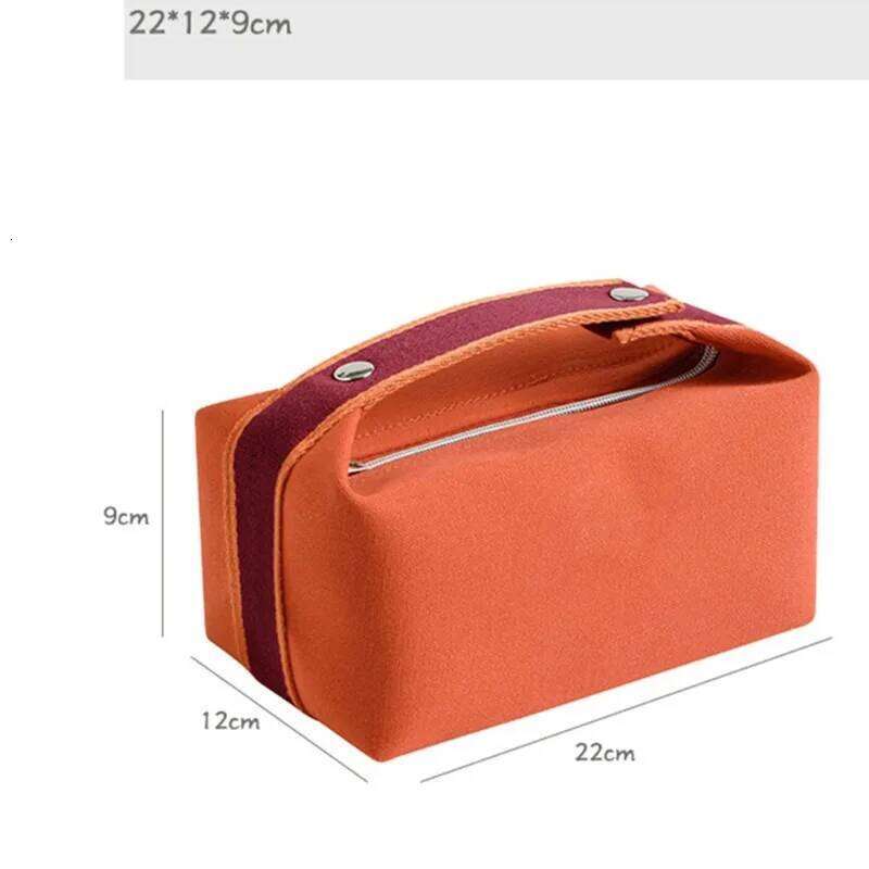 Simple and portable hand-held canvas personalized unisex makeup large capacity waterproof storage bag, toiletry bag. Y260206