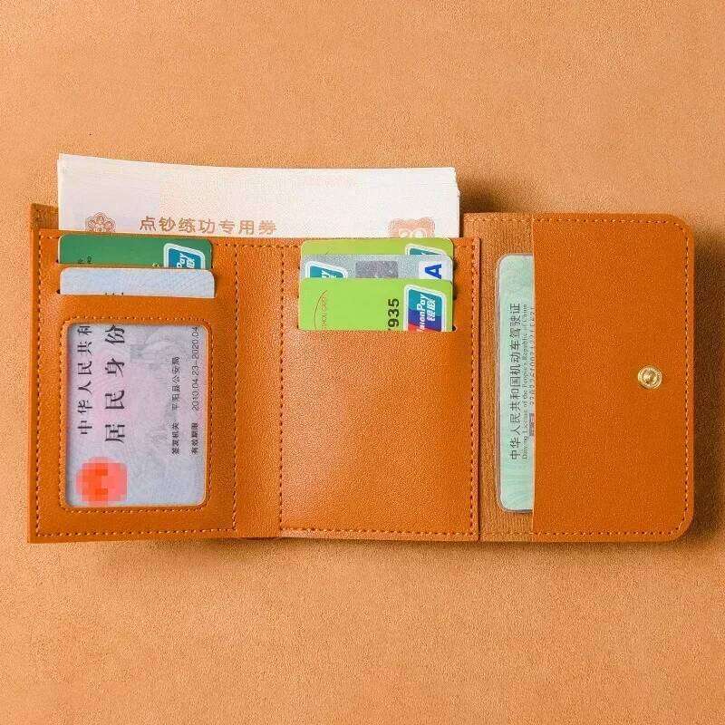 2025 New Women's Simplified Folding Button Small Driver's License Card Bag Male Student Soft Leather Wallet Y260206