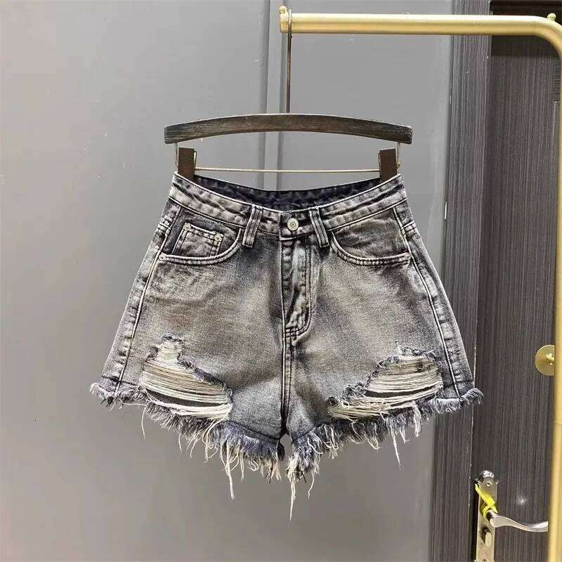 Worn Legs with Rough Edges Washed Black 2026 Summer New Women Fashion A-line Wide Leg Hole Ripped Denim Shorts C260206