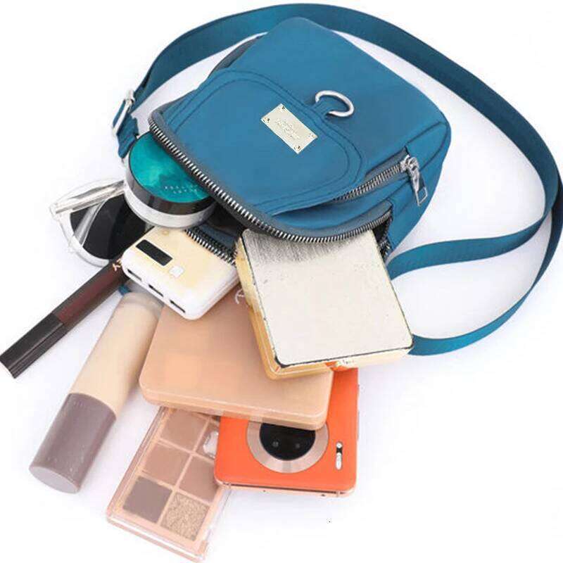 Neutral style backpack men women, suitable for travel and photography, multi-layered pocket, cross-body bag XJ260129