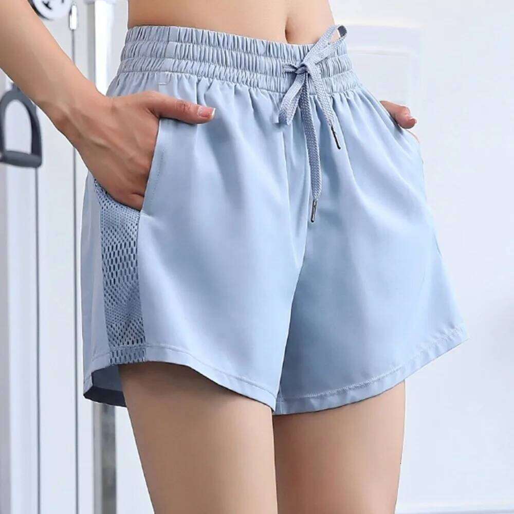 Casual Mesh Design Yoga Side Pockets Hem Elastic Sports Loose Fitting Breathable Fitness Shorts Women XJ260206