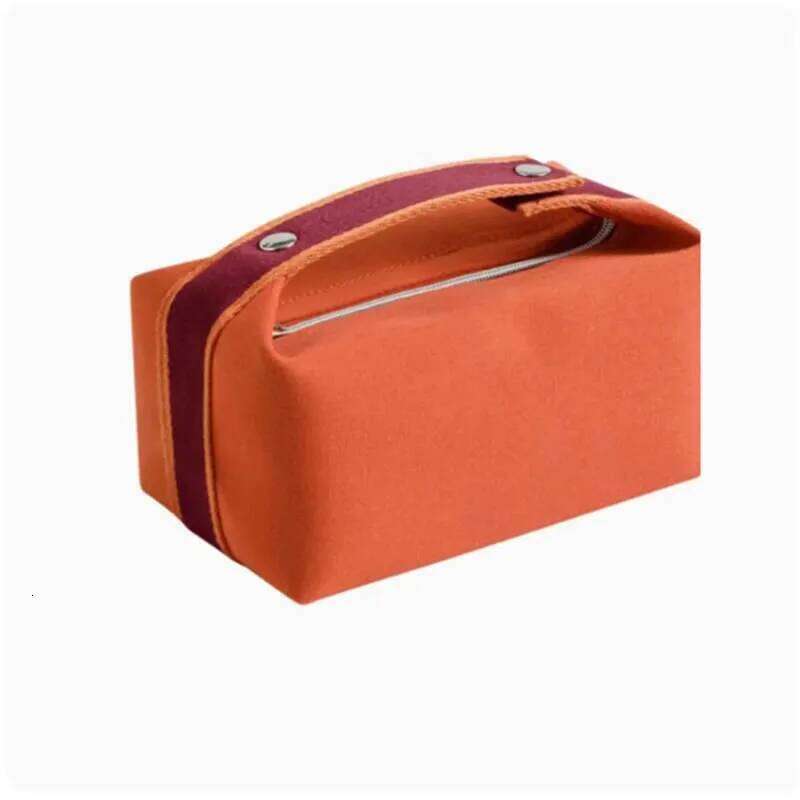 Simple and portable hand-held canvas personalized unisex makeup large capacity waterproof storage bag, toiletry bag. Y260206