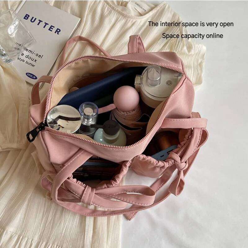 2026 New Korean Bow Nylon Shoulder Fashionable and Sweet Design Tote Bag Folded Large Capacity Commuter Women's Handbag Y260205