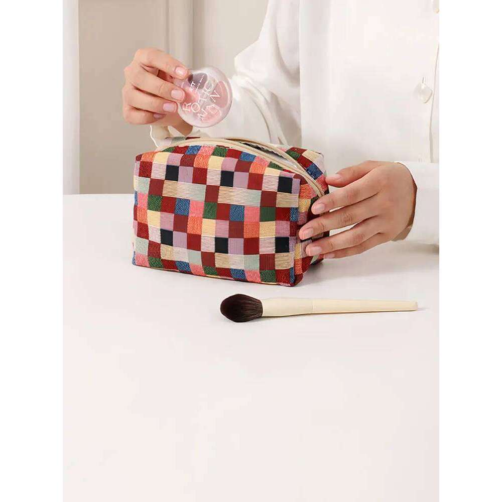 1PC Autumn and Winter new checkered travel makeup Bag Portable large-capacity clutch Y260206