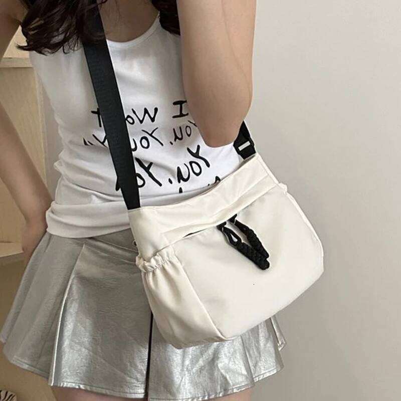 The Neutral Color Suitable for Daily Commuting and Going to School It Is Cross-Body Bag or a Student Bag. XJ260129