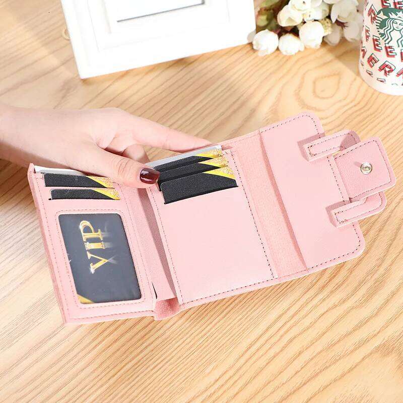 New Korean version of solid color belt ladies female coin purse clutch bag student short wallet Y260206