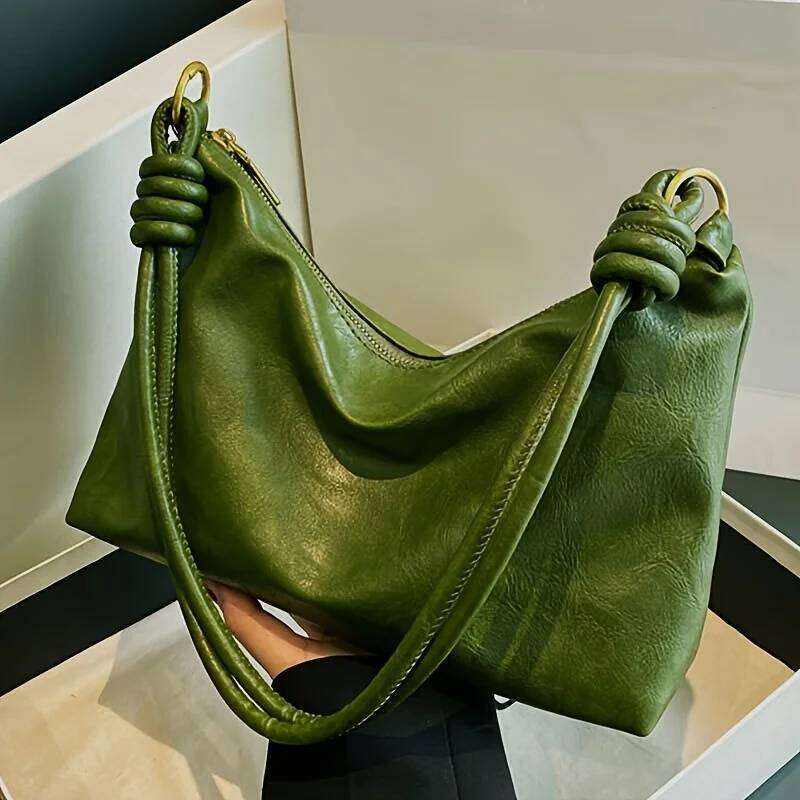 The new fashionable and high-end womens soft-touch shoulder bag is a geometric wide-band cross-body commuting handbag. Y260204