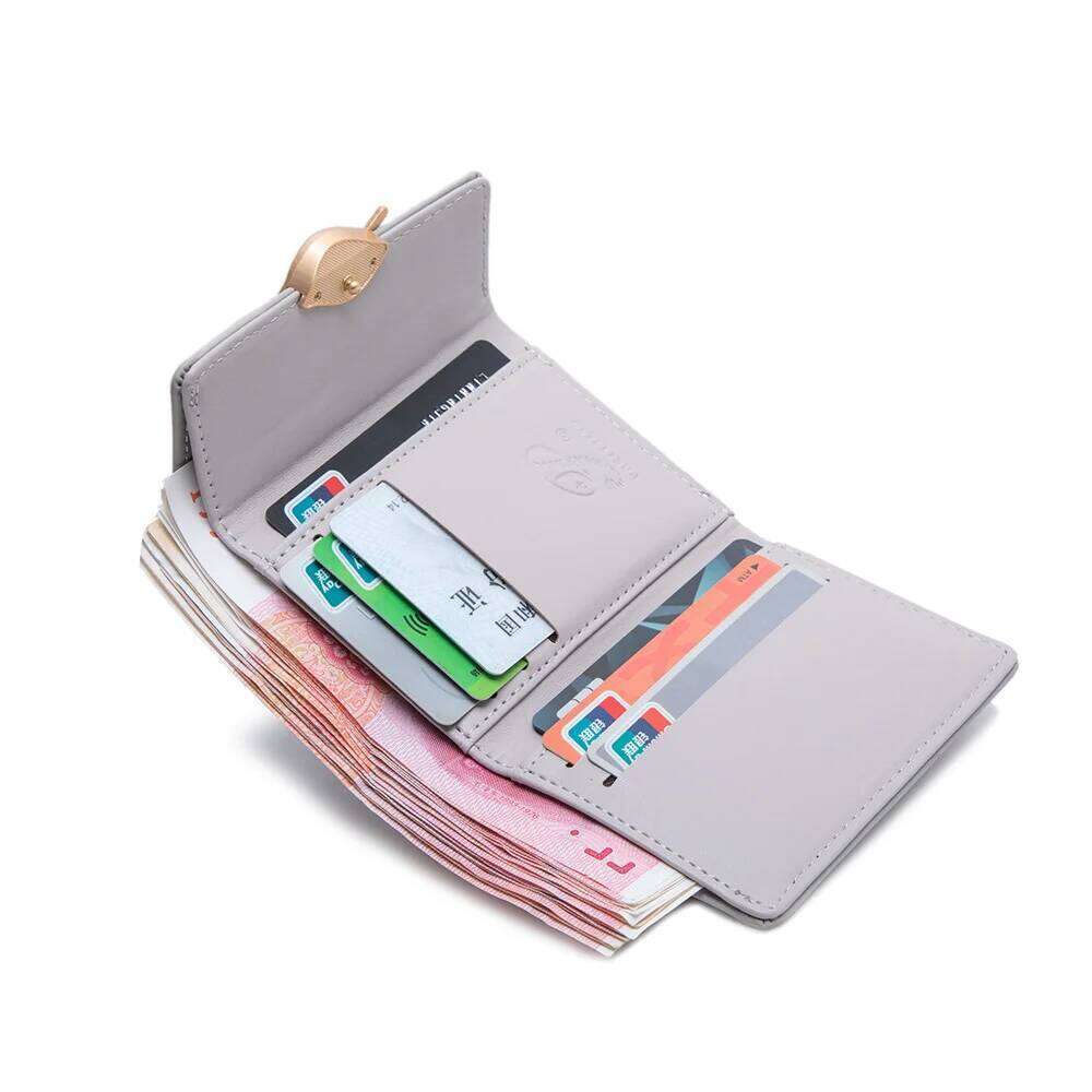 New purse Female Japan and South Korea small fresh PU solid color three fold bag multi-card folding large capacity coin student Y260206