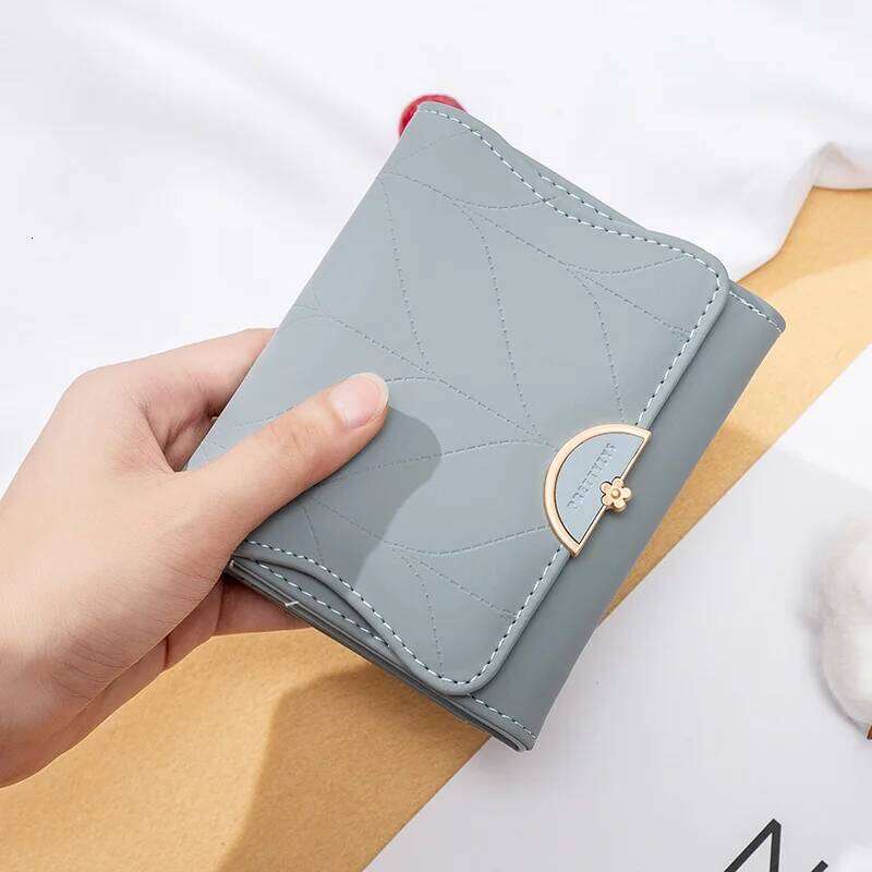 2023 new women's short purse Japanese and Korean PU soft hardware buckle simple trend everything niche large capacity handbag pu Y260206