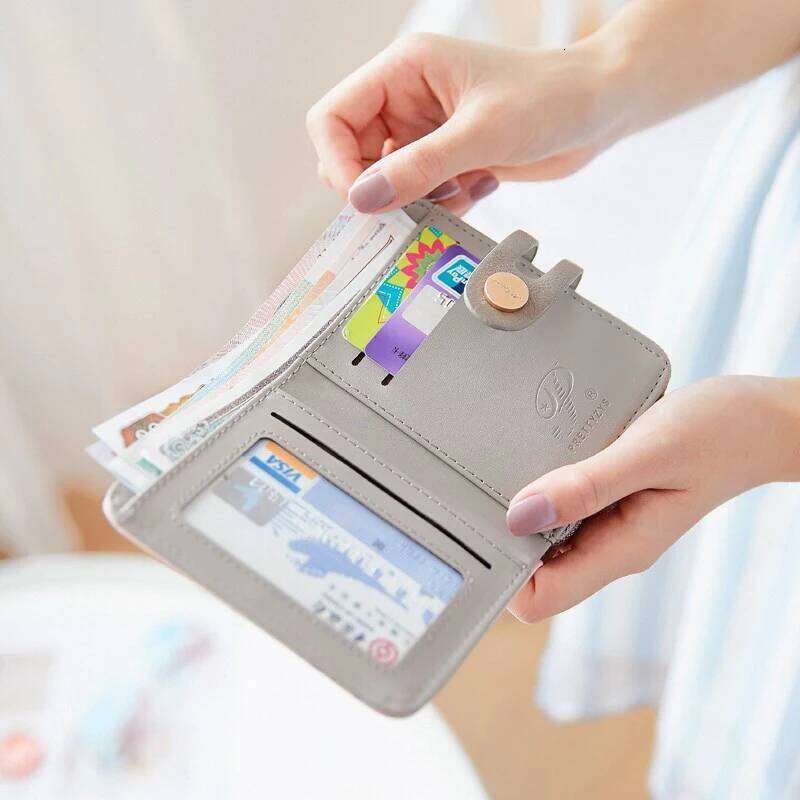 Spring summer new purse female short Japanese and Korean PU printed zipper buckle fashion mini trend money clip creative mul Y260206