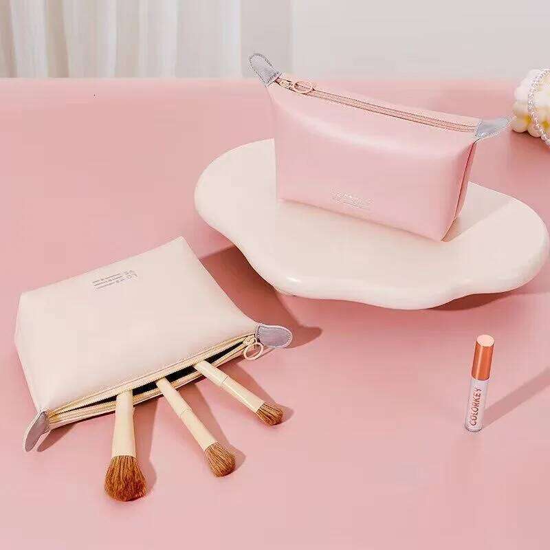 Fashion PU cosmetic Large capacity travel grooming Cosmetics storage Waterproof internet celebrity makeup bag Y260206