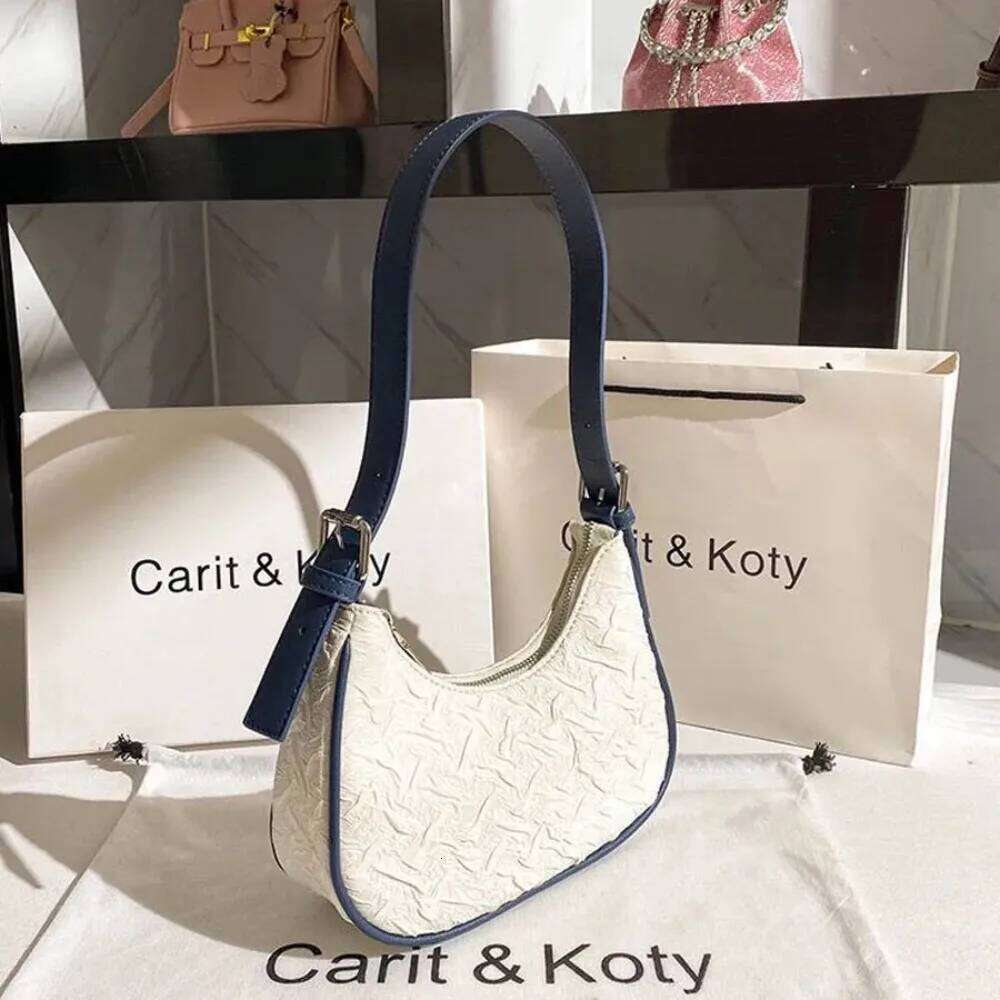 Original advanced sense this year's popular pleated female summer niche design crescent underarm bag shoulder Y260205