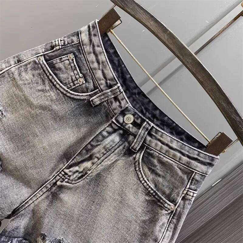 Worn Legs with Rough Edges Washed Black 2026 Summer New Women Fashion A-line Wide Leg Hole Ripped Denim Shorts XJ260206