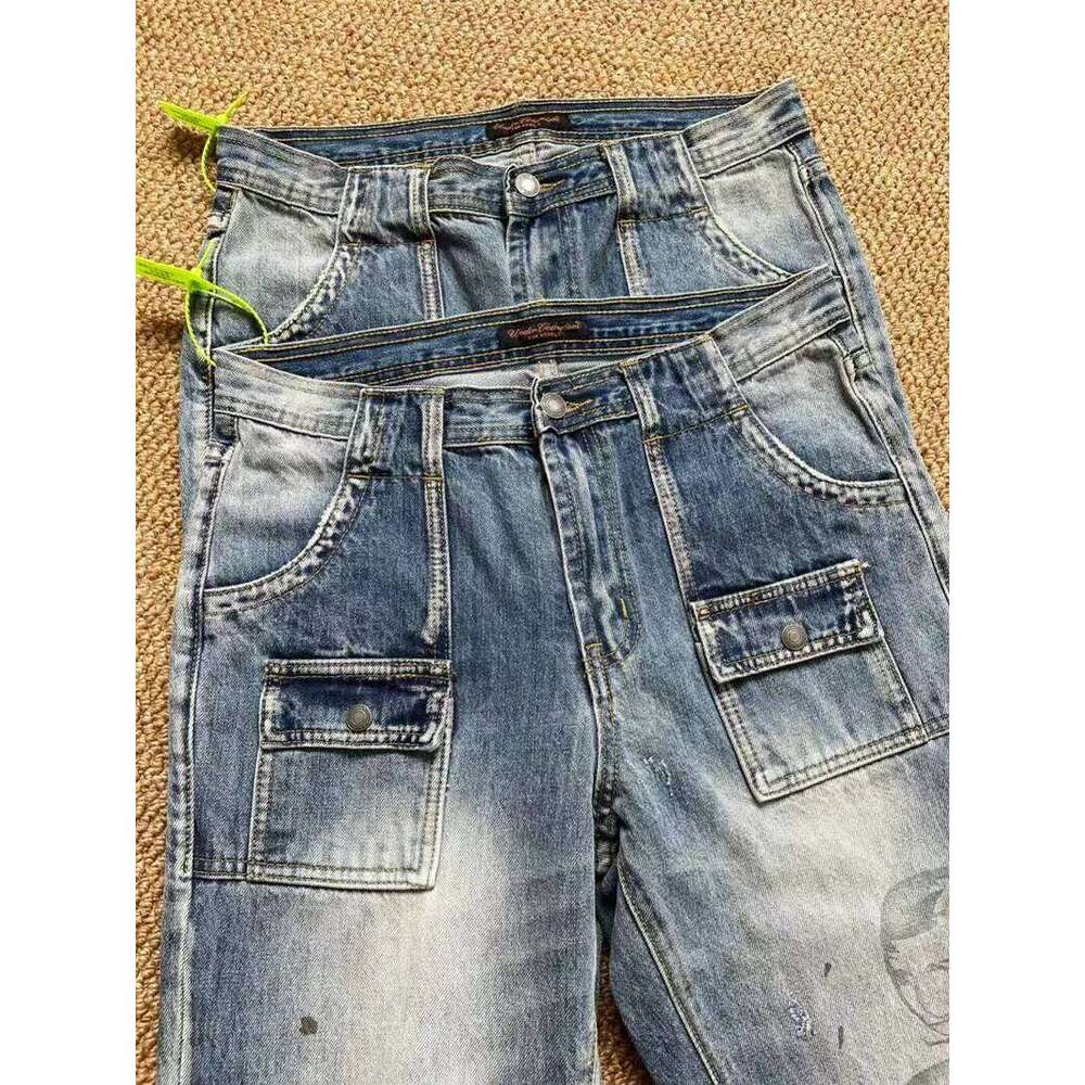Undercover Multi Personality Face Portrait Print Jeans Men Women Unisex Washed Distressed Hole Damaged Burr Micro Flared Pants 26L0507